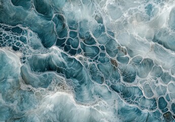 Obraz premium Abstract Ocean Waves Texture with Swirling Patterns and Soothing Blue Tones for Background and Design Use