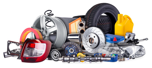 huge stack pile of car parts including wheels, tires, filters, and engine components isolated white background. automotive vehicle repair and service industry concept.