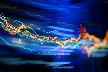 Dynamic stock market analysis with vibrant chart lines on a dark blue backdrop, representing financial insights and investment trends, driving business growth