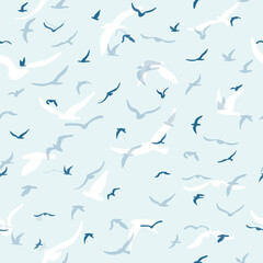 Flock of flying silhouette birds. Birds seamless pattern. White seagulls on a blue background. Vector i