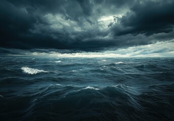 Obraz premium Dark and Stormy Ocean Waves Under Heavy Clouds with a Dramatic Sky, Capturing the Essence of Nature's Power and Beauty in Turbulent Conditions