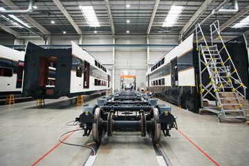 Carts wheel sets near wagons in the assembly shop. No AI tools