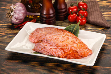 Raw marinated duck breast for cooking