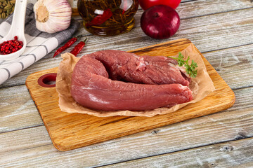 Raw pork tenderloin for cooking