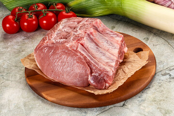 Raw pork loin cut with bone