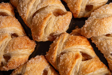 Apple strudels with crispy sugar crust. Freshly baked. Traditional apple strudels made with...