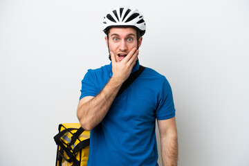 Young caucasian man with thermal backpack isolated on white background surprised and shocked while looking right