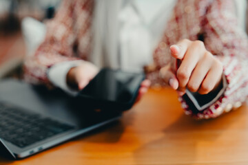 Business Professional Pointing Towards Camera While Holding Smartphone, Business concept