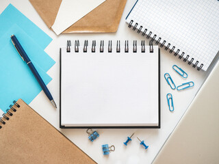 Blank notepad page for congratulatory inscriptions. Day light. Close-up, indoors. Studio shot. Finance and business concept. Congratulations for family, relatives, loved ones, friends and colleagues