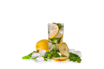 Glass of lemonade with lemon slices and mint and ice