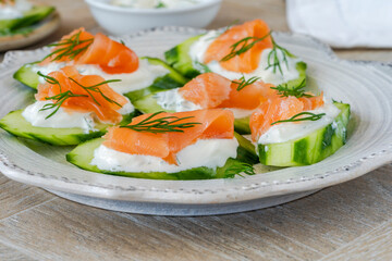Cucumber and smoked salmon bites with sour cream and dill