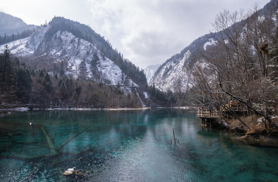 Five Flower Lake in Jiuzhaigou, is a UNESCO world natural and cultural site. As the world's most beautiful national park, it features unique waterfalls, colorful lakes