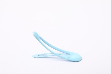 One blue hair clip on white background