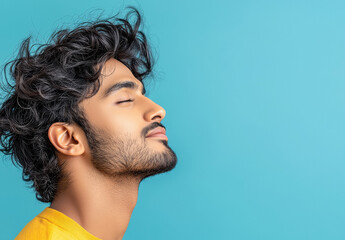 Fototapeta premium Handsome Indian men with natural lips, natural makeup, side profile