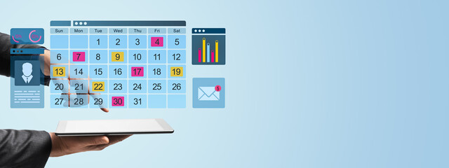 Businessperson managing calendar on tablet.