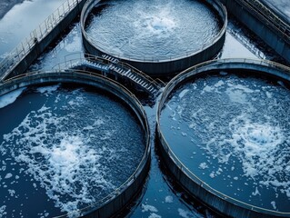 Aerial view of industrial water treatment facility, purifying processes