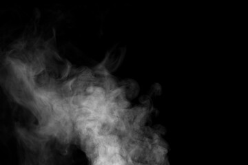 Mysterious smoke billows out, separated from the background, creating an abstract mystical atmosphere as particles of vapor and incense float into the air. Dark grey smoke mixes with mistvapor