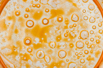 greasy round spots on white background.