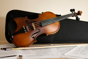 Fototapeta premium violin and violin bow with music sheet