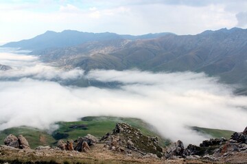 fog in the Caucasus mountains in the morning