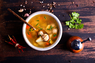 bowl with soup, fresh soup with meatballs and vegetables