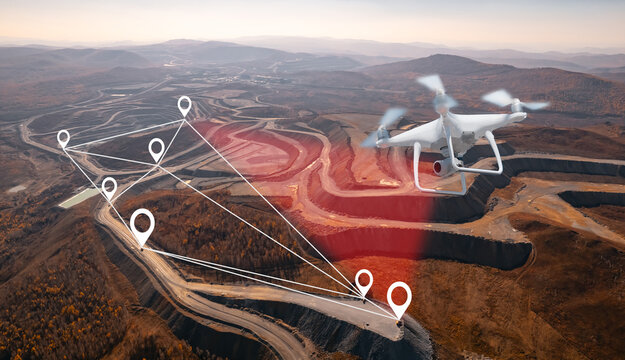 Innovation aerial uav drone copter flying with camera above opencast mining open coal. Concept engineering geology industry