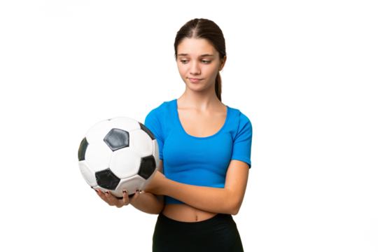 Teenager caucasian girl playing football over isolated background with sad expression - Powered by Adobe