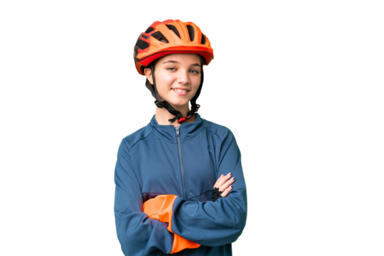 Teenager cyclist girl over isolated chroma key background with arms crossed and looking forward