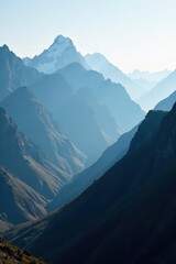 Fototapeta premium Dark mountain range with a white misty veil in the distance, atmosphere, solitude