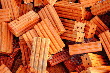 Pile of Red Clay Bricks for Construction