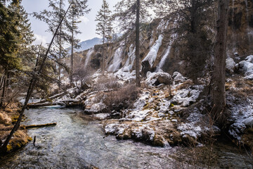 Pearl Shoal Waterfall in winter season, is a waterfall located in Jiuzhaigou, Sichuan Province, China, steam, cascade