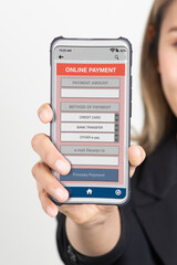 Electronic payment application on smartphone on girl hand.