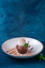 hot chocolate dessert fondant with ice cream, hot chocolate pudding with vanilla ice cream ball