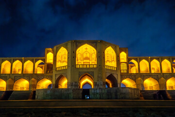 Night view of the central part of Khaju Bridge, Isfahan, Iran. This is one of the most beautiful historic bridges in the city.