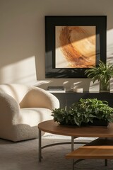 Comfortable armchair near coffee table with green plants, frame and painting on wall in modern living room