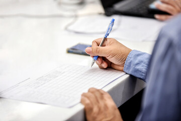 businessman signing a document