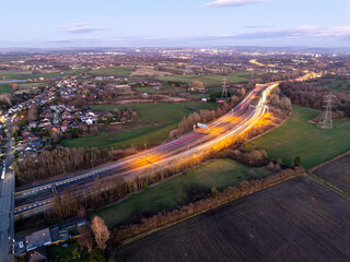 Long exposure aerial image of M60 Manchester outer ring road at Simister 
