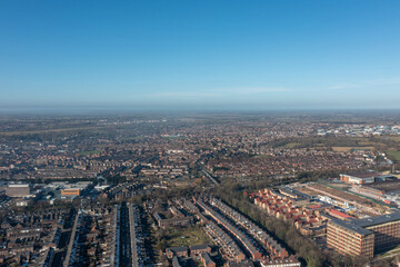 Obraz premium Aerial drone photo of the city of York in North Yorkshire England showing a birds eye view of the British town and rows of houses and large suburban housing estates taken in the winter time