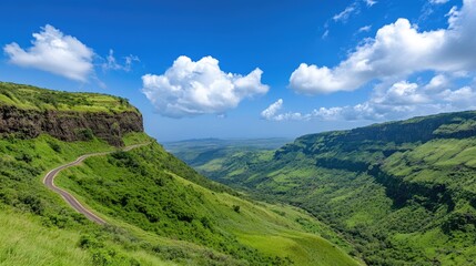Fototapeta premium Breathtaking scenic drive through lush green valleys western ghats nature photography serene environment aerial view travel inspiration