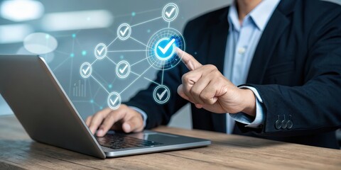 A professional man interacts with a laptop, highlighting digital checkmarks in a network, symbolizing efficiency and validation in technology.