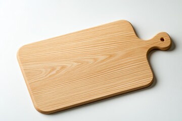 Wooden chopping board rests on a white surface highlighting its natural texture and grain pattern ideal for kitchen use and food preparation