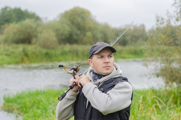 Portrait of a happy fisherman.