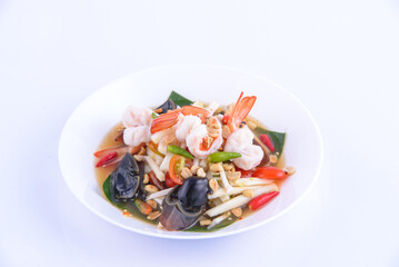 Spicy mixed seafood salad on the white background.