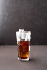 Cold iced coffee in a clear cup.