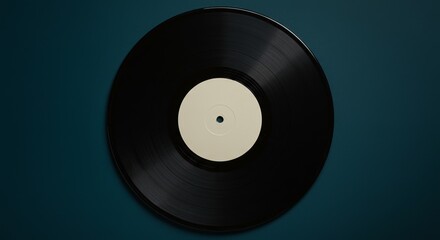 Vintage vinyl record with blank label isolated on dark teal background