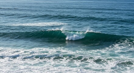 Fototapeta premium Crashing Waves in the Blue Ocean: a powerful display of natural forces
