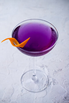 Purple Gin Tonic Cocktail with orange
