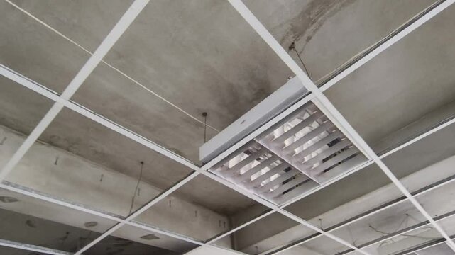 structure of ceiling suspension, installation of gypsum plasterboard and light.