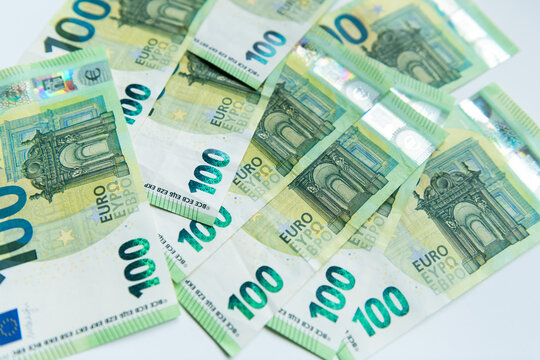 euro banknotes background for finance. onehundred bills at the table in closeup