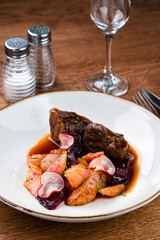 tender beef cheek with new potatoes